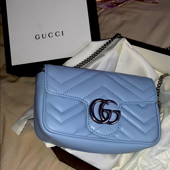 Gucci Handbags - collecting dust in my closet .